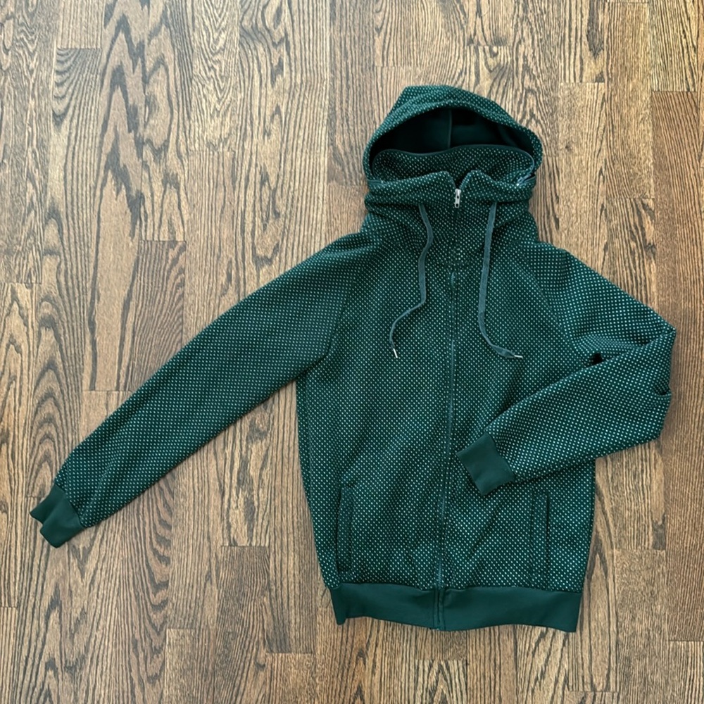 Men’s medium green zipped hoodie with white polka dots pattern